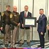 Left to right are Virginia Department of Criminal Justice Services Director Jackson Miller, Accreditation Manager Deputy Jonathon Vipperman, Capt. Charles Sanders, Sheriff Grant Kilgore, Virginia Secretary of Public Safety and Homeland Security Robert Mosier, and Chief Deputy Russell Cyphers.  SHERIFF’S OFFICE PHOTO