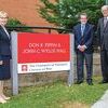 Chancellor Donna Henry, Jeffery Sturgill and Dr. Joseph Smiddy showcase the new Pippin-Wyllie Hall sign.  UVA WISE PHOTO