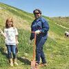Claire Bolling, left, and Caroline Smith were among volunteers planting trees last Thursday at the Project Intersection site.  KENNETH CROWSON PHOTO