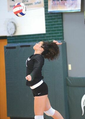 Leci Sensabaugh eyes the serve as the Lady Spartans defeated the Lady Warriors in the Region 1D semifinals. PHOTO BY KELLEY PEARSON