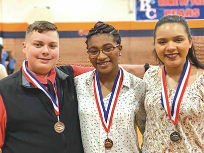 Lone senior Dasanye Smith (right) pictured with fellow state qualifiers Noah Elkins (left) and Shamiyeh Noel (middle).
