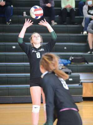 The Lady Spartans’ Tinley Hamilton sets the ball for the front line. PHOTO BY KELLEY PEARSON