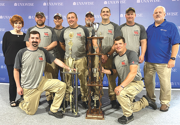Wellmore Coal took the top prize in this year’s Governor’s Cup. Front row, left to right, are Anthony Grizzle and Jordan Corry. Back row, left to right, are Barbara Altizer, Metallurgical Coal Producers Association; Chris Turner; Will Altizer; Shannon Moore; Johnny Branh; Brandon Rasnake; Joey Fuller; and Randy Moore, Virginia Energy Director of Coal Programs.  DEPARTMENT OF ENERGY PHOTO