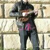 Thomas Cassell was a Burton High School senior in 2015 when this photo was taken for an interview about his emerging recognition as a mandolin virtuoso. FILE PHOTO