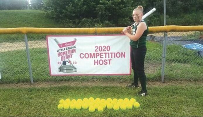 Brooklyn Rutherford poses with her 40 home run balls during the 2020 little league season.SUBMITTED PHOTO